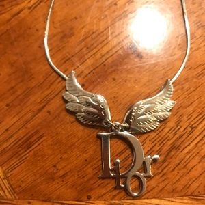 Dior silver wings with “Dior” necklace